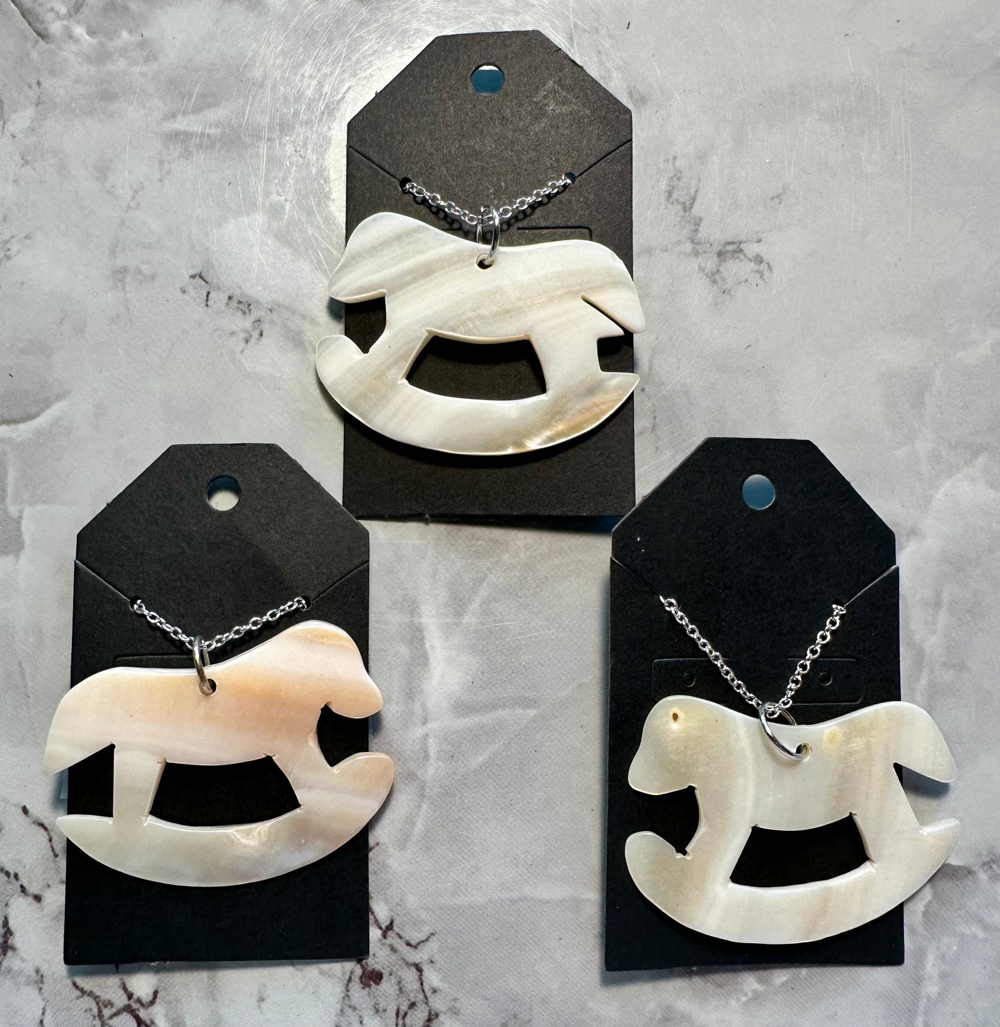 Rocking horse necklace